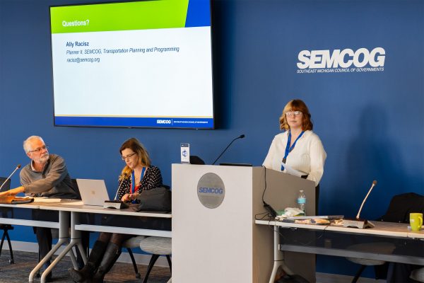 SEMOG conference room with panelists and presentation screen at Southeast Michigan Council of Governments.