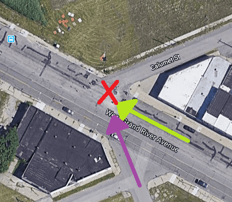 Collision between car and bike at intersection