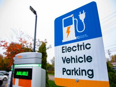 Electric vehicle parking sign outdoors