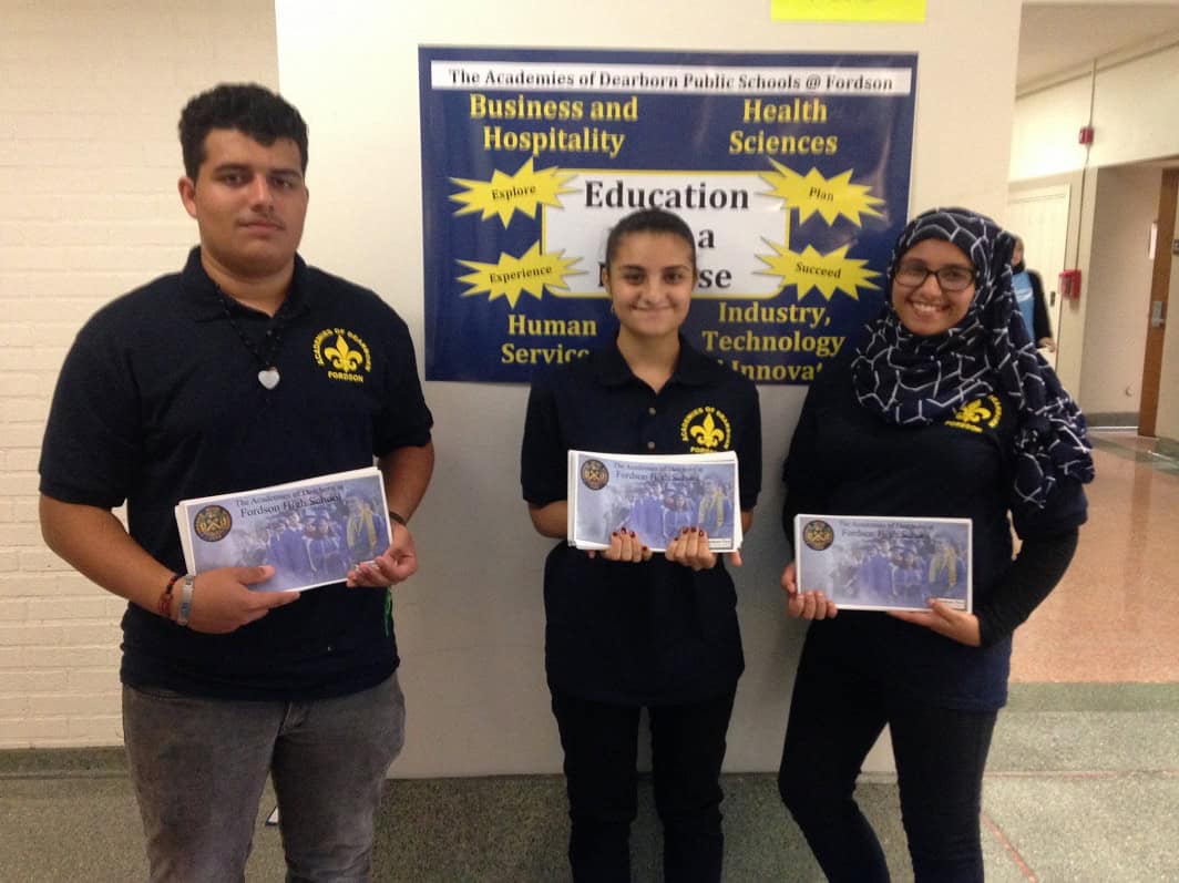 Students showcasing educational programs promoted by SEMCOG at Fordson High School.