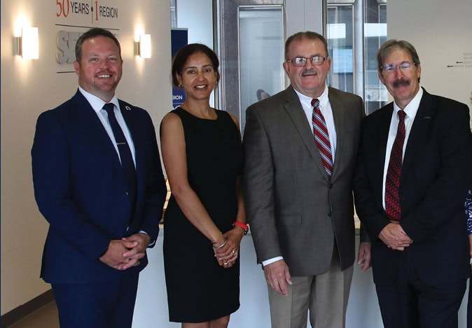 SEMCOG officers Chris Barnett, Mandy Grewal, and past chair Phil Weipert