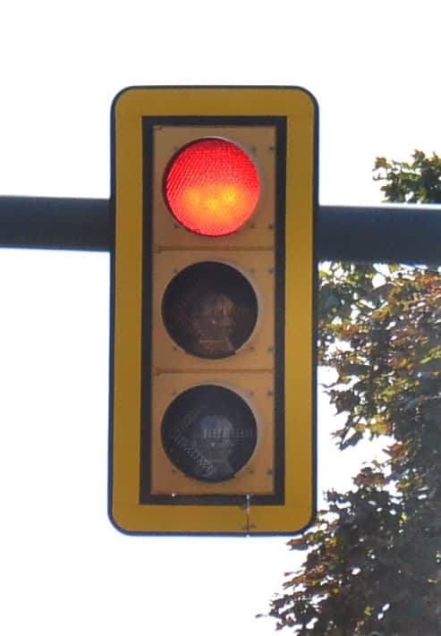 Signal with backplate