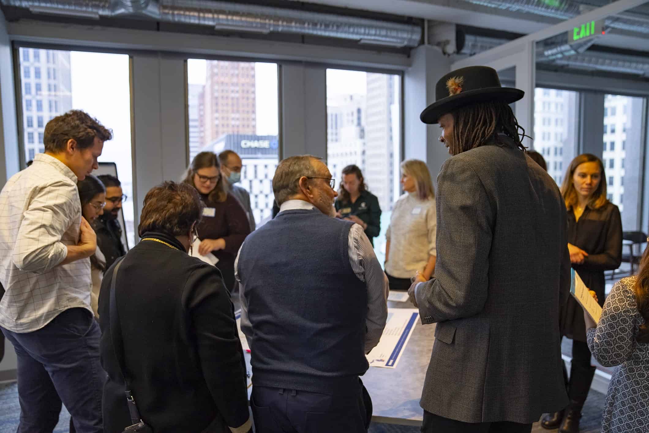 Summit attendees talking