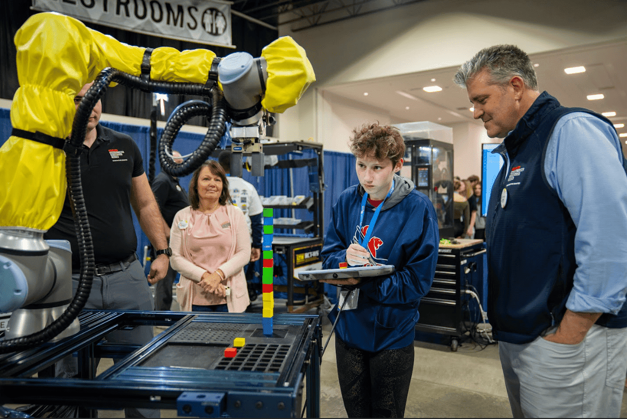 students using technology at an event