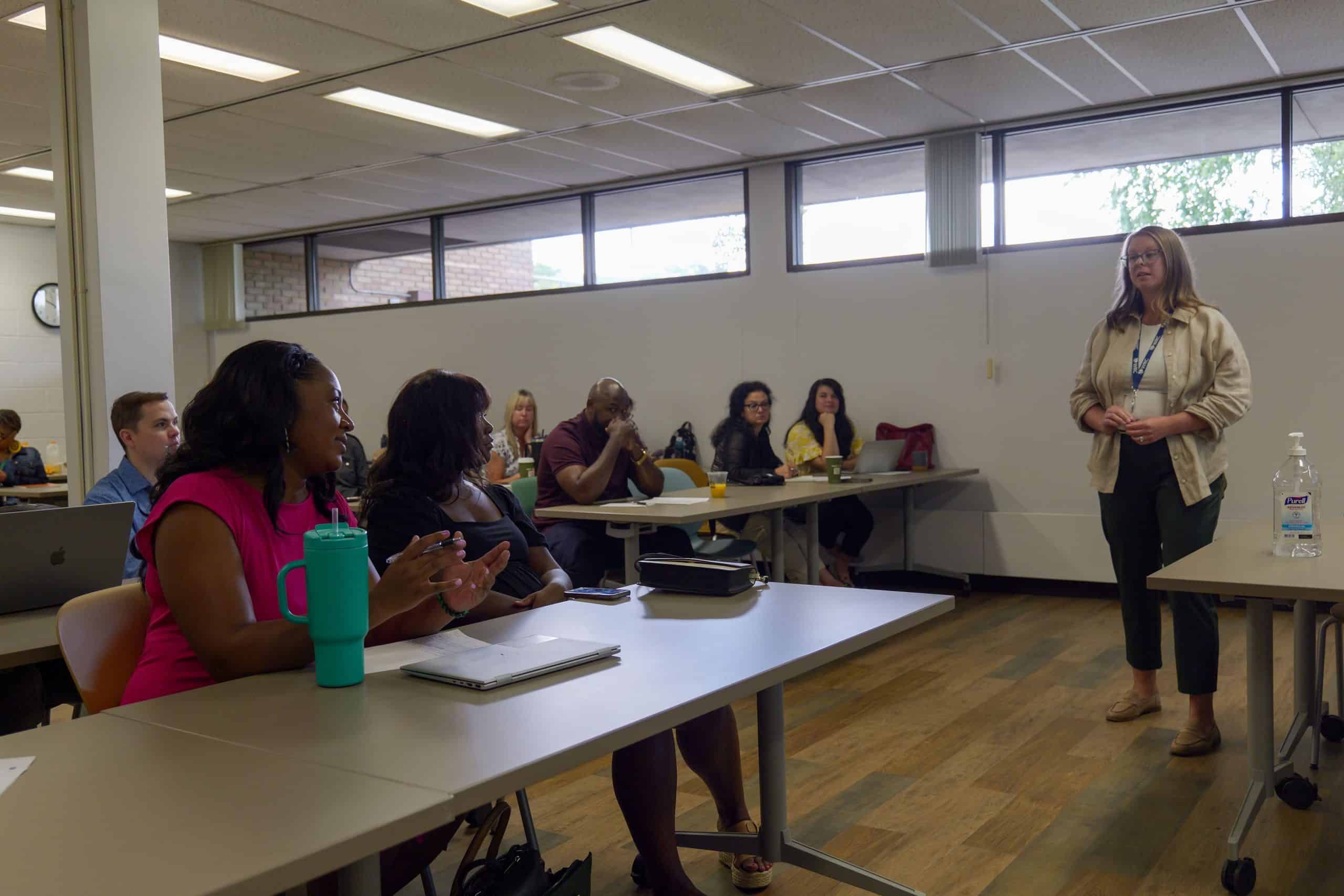 Presenter speak to room with attendees