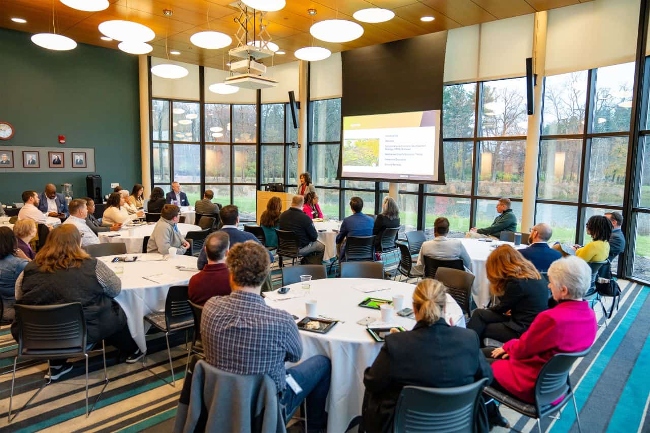 SEMCOG conference room with diverse attendees during a professional presentation.