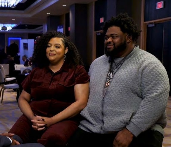 Community leaders engaged in discussion at SEMCOG conference for regional transportation planning and sustainable urban development.