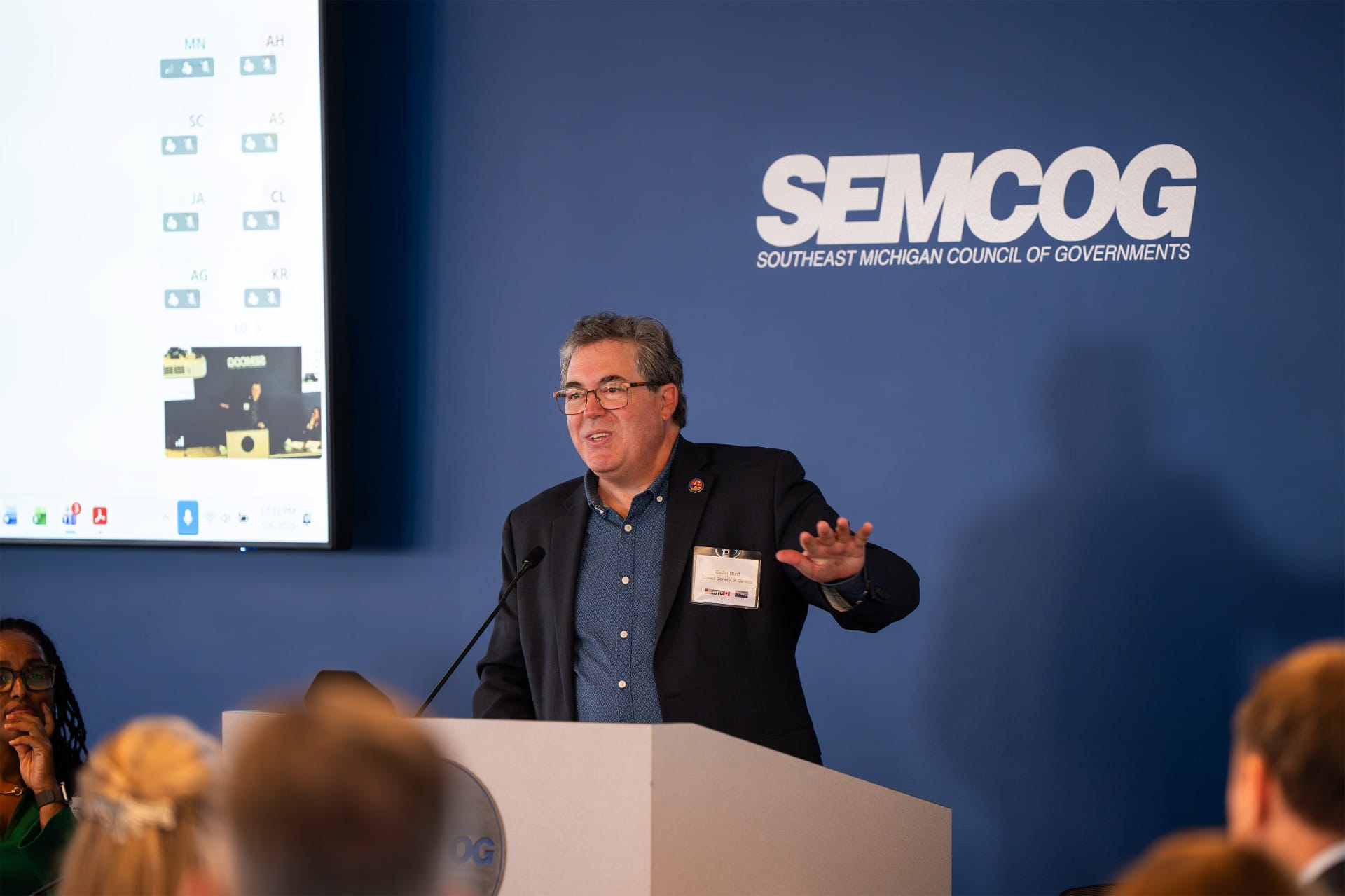 SEMCOG conference speaker presenting at Southeast Michigan Council of Governments event.