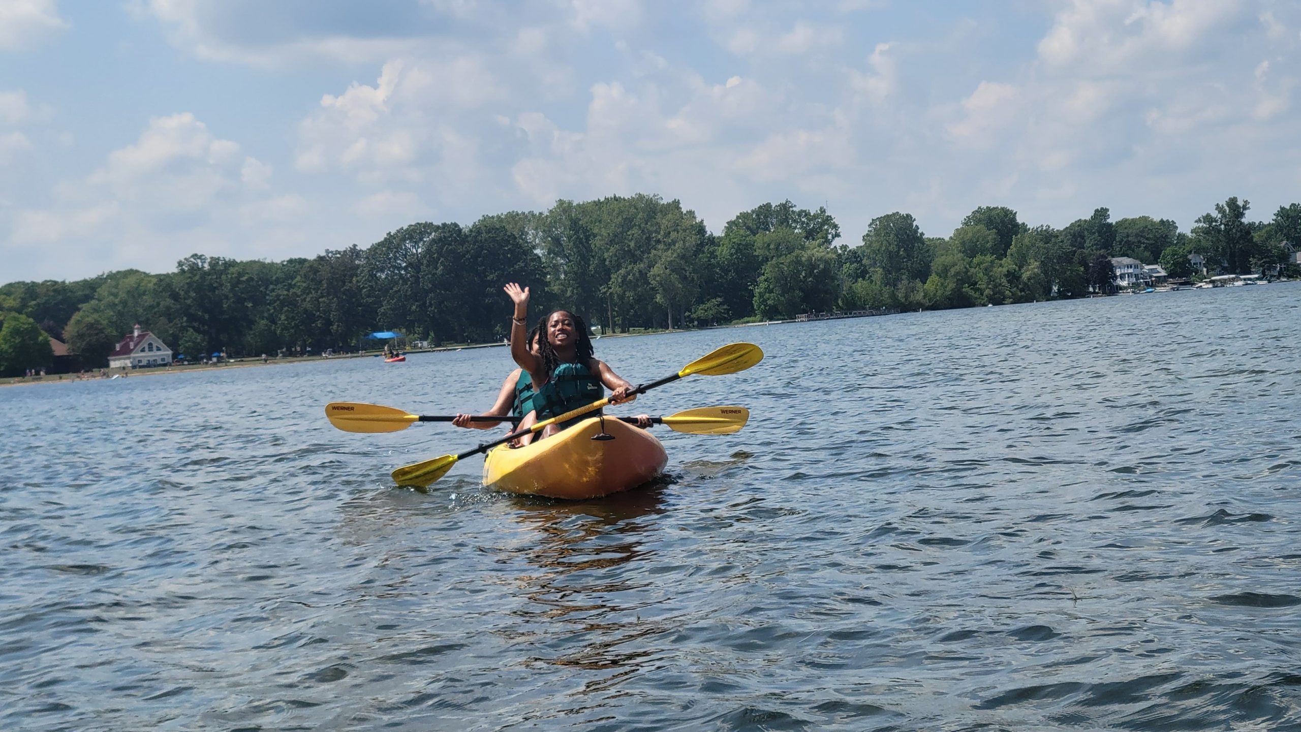 Woman in kayak on water